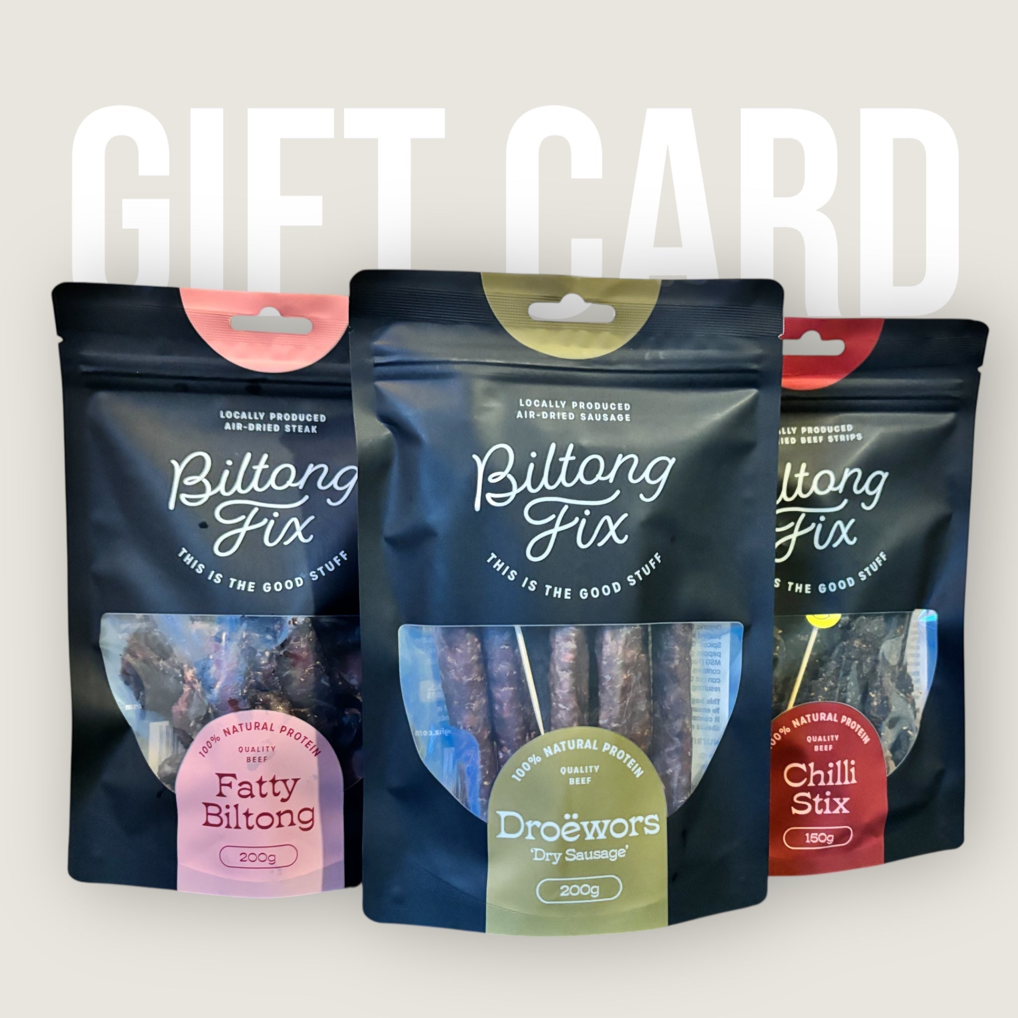 Image of 3 bags of biltong with writing behind it
