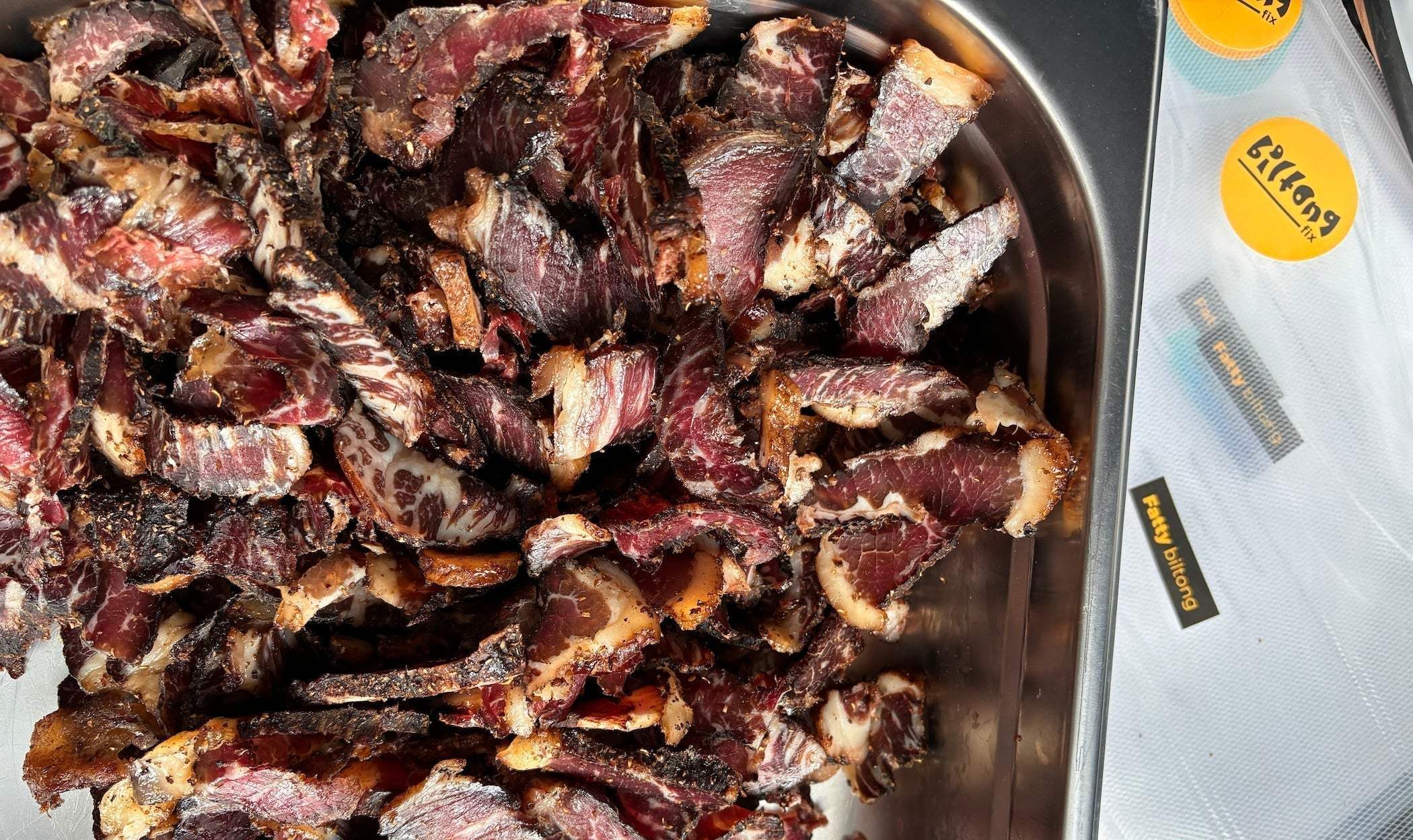 Biltong in a bowl sliced fatty biltong and looking delicious