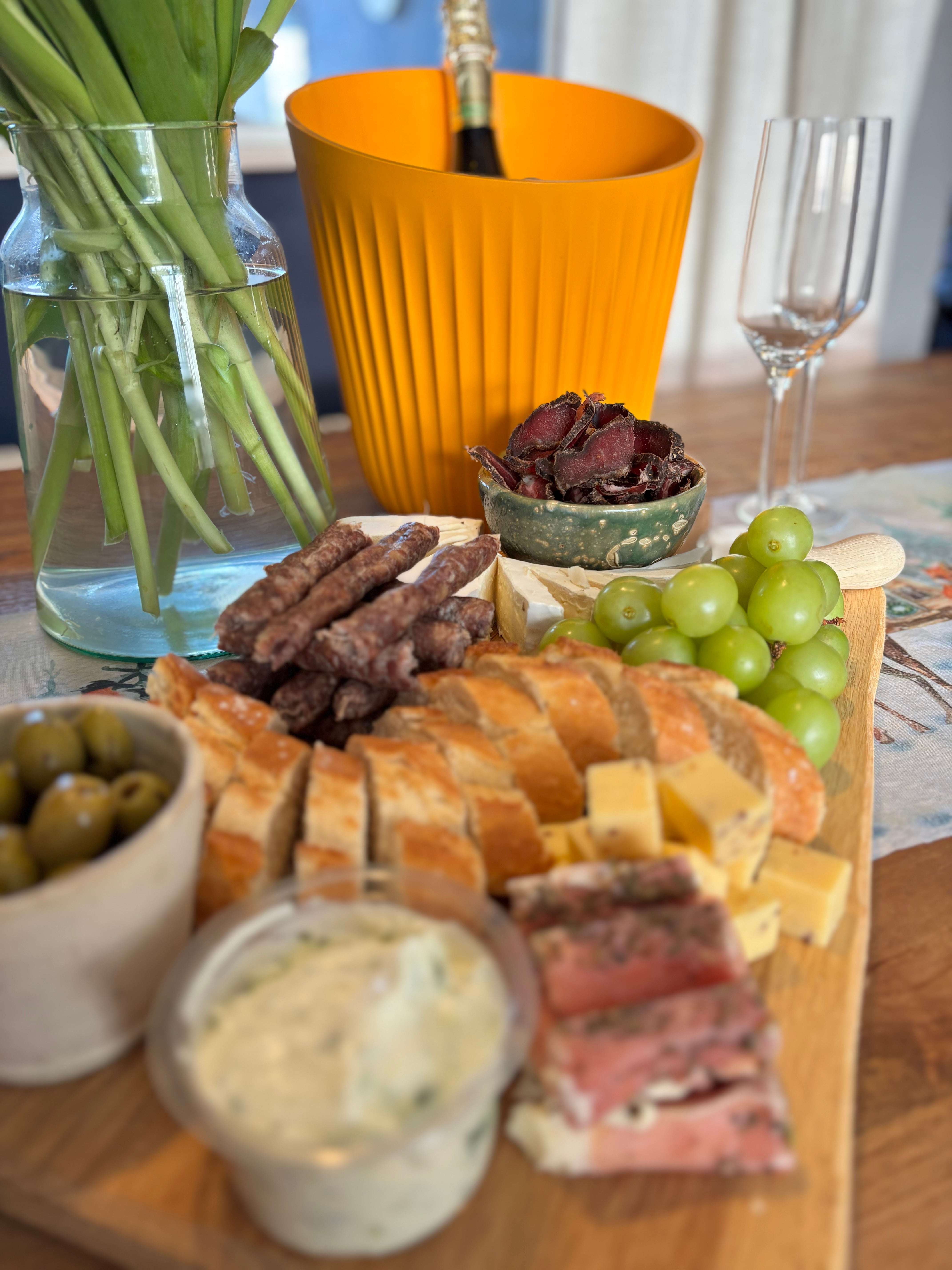Platter of biltong with other snacks and sliced fatty biltong